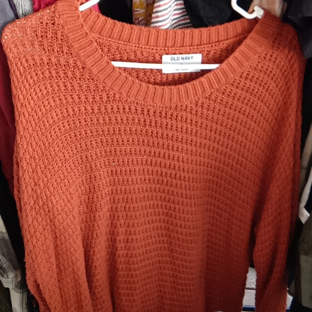 Orange knitted sweater